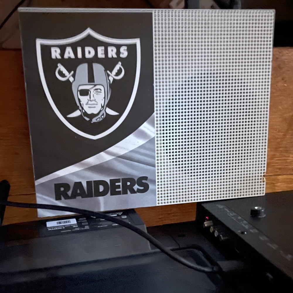 one small burn on the corner console works and comes with games and my account